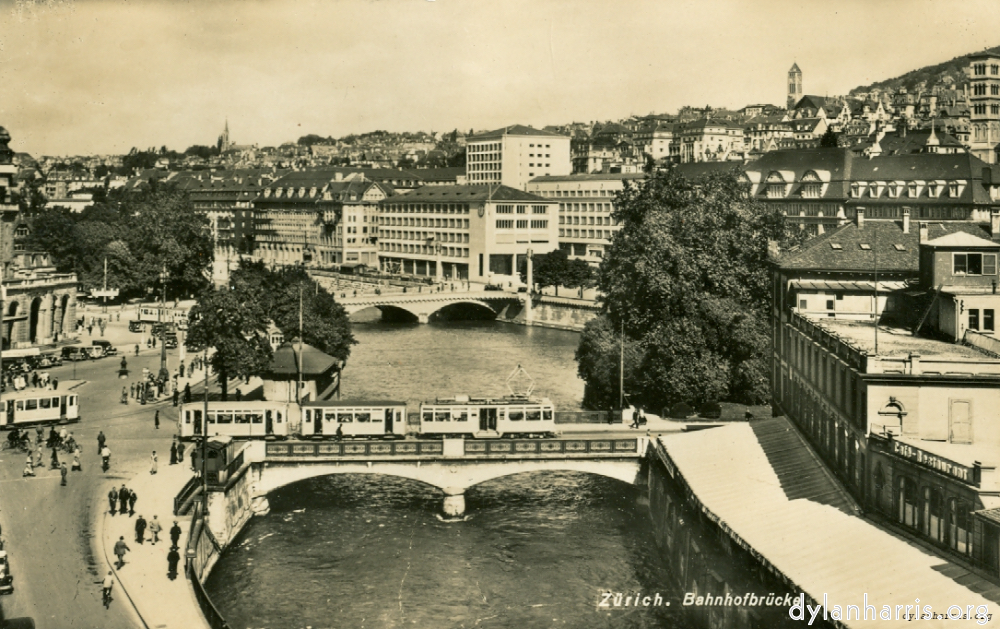 image: Postcard: Z&uuml;rich. Bahnhofbr&uuml;cke [[ The Station Bridge. Over the River Lummat, Z&uuml;rich. ]]